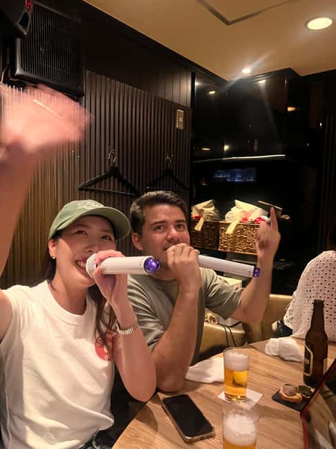 3.5h Osaka Night guided Local Bar Hopping, Sake & Karaoke - Karaoke with local customers
