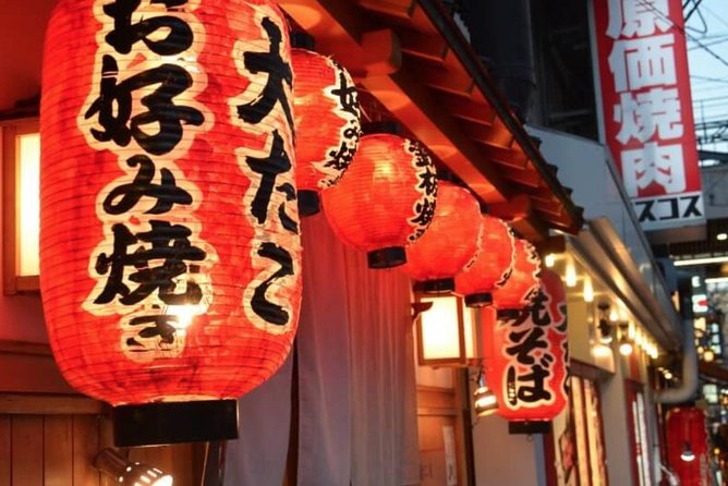 Absolute Osaka Food Tour - Meeting the Glico runner in Dotonbori