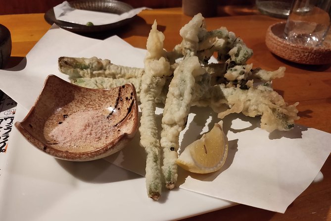All-inclusive Hiroshima Nighttime Food and Cultural Immersion - Food variety, from okonomiyaki to unfamiliar bar dishes