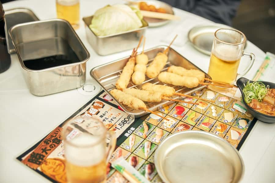 Eat Like a Local in Osaka – Private Custom Street Food Tour - Kushikatsu, yakisoba, and oden