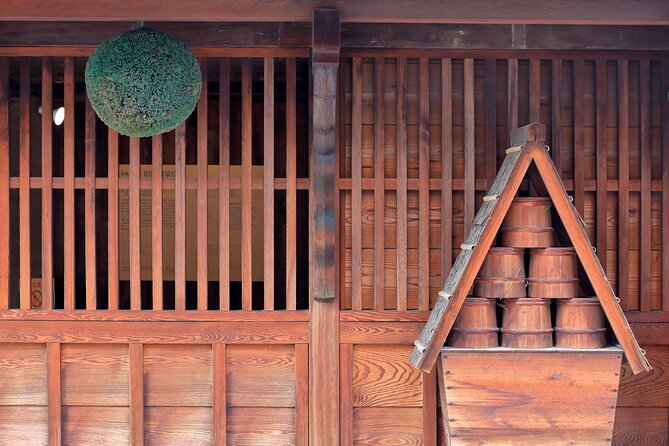 Exploring Nada Sake Breweries Kobe Private Tour with Government-Licensed Guide - Sakagura Dori Rengakan adds a modern shopping and tasting stop