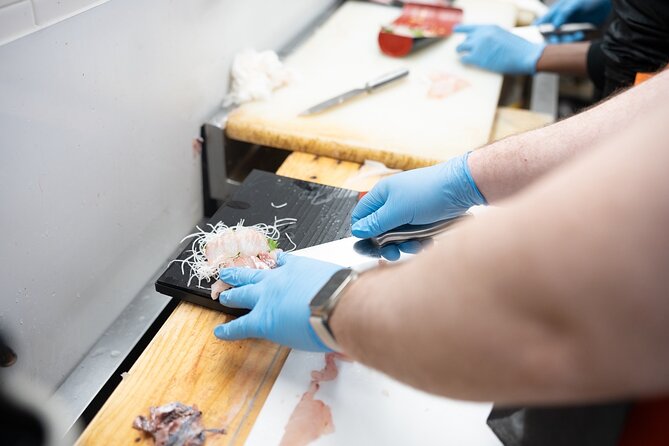 Fish Cutting workshop in Kyoto Japan - Cutting the fish into three pieces