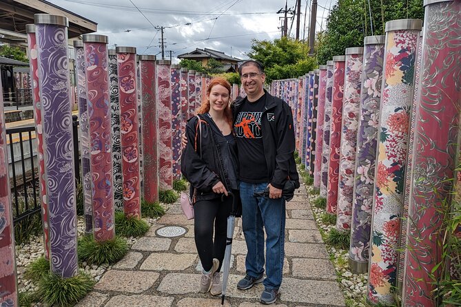 Full day Kyoto Walk in Fushimi, Arashiyama, Monkey, and Kinkakuji - Walking beneath the torii at Fushimi Inari