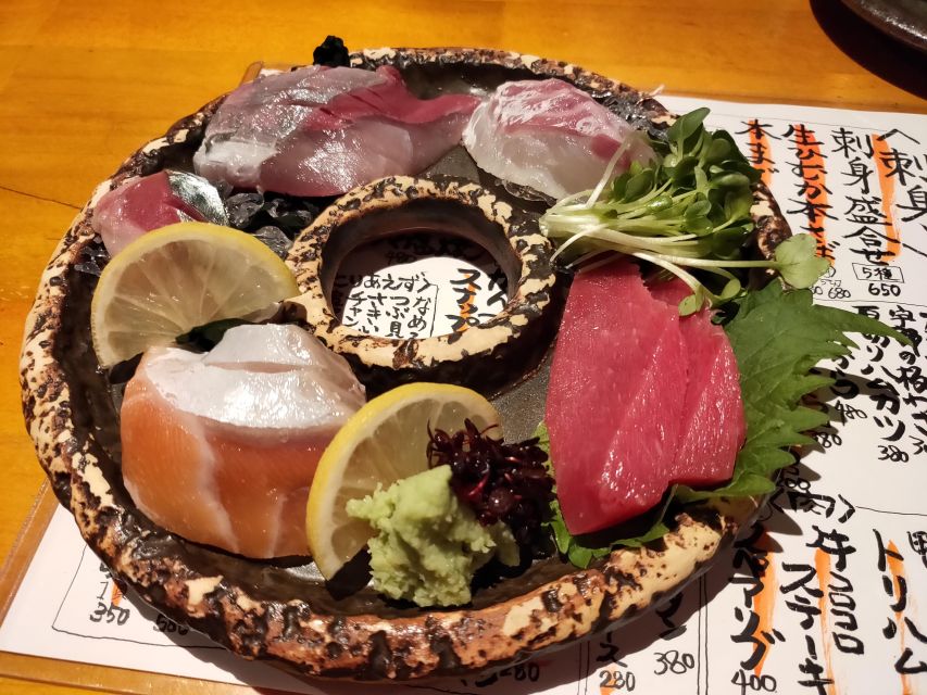 Hiroshima: Food and Culture Guided Walking Tour with Dinner - Stop one: your first small plates and drink