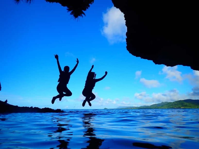 Ishigaki Island: Blue Cave Exploration & Snorkeling Tour - Entering the limestone cave in northern Ishigaki