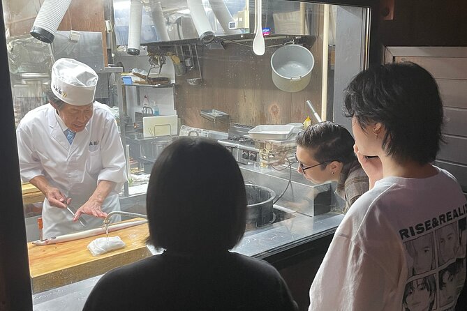 Kawagoe Japanese Food Tour : Unagi Kaiseki and Sake near Tokyo - Holding the eel and watching the preparation