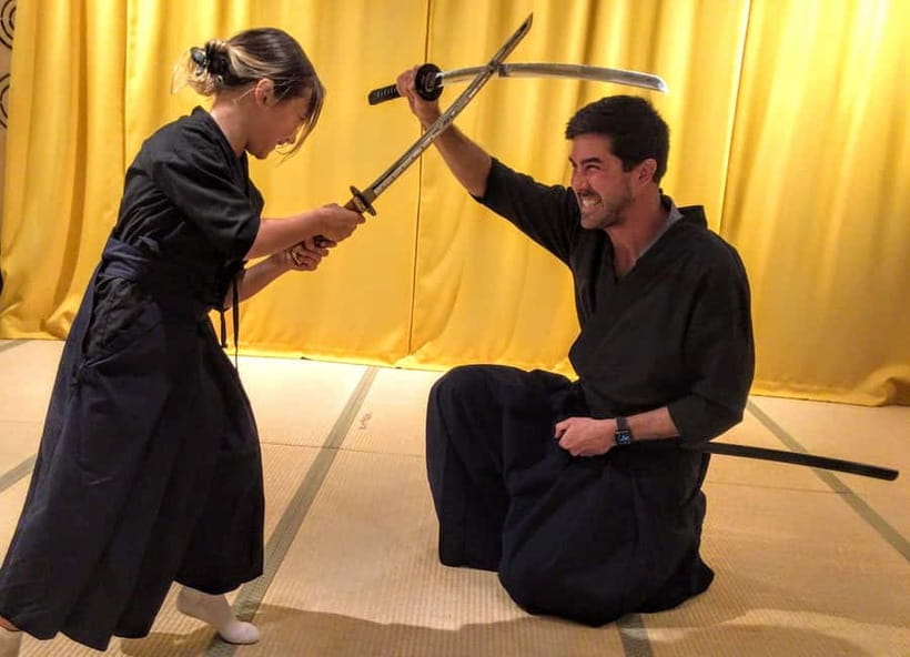 Kyoto : Family-Friendly Sword Lesson at Samurai Ninja Museum - Putting on hakama before the sword lesson