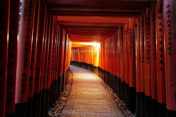 Kyoto Fushimi-Inari Night Walking Tour - Walking beneath the torii gates toward Mount Inari