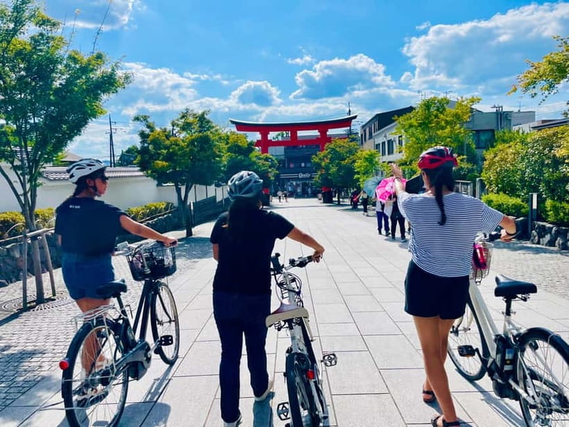 Kyoto: Fushimi Inari Shrine and Tofukuji Temple E-Bike Tour - Riding back beside the river