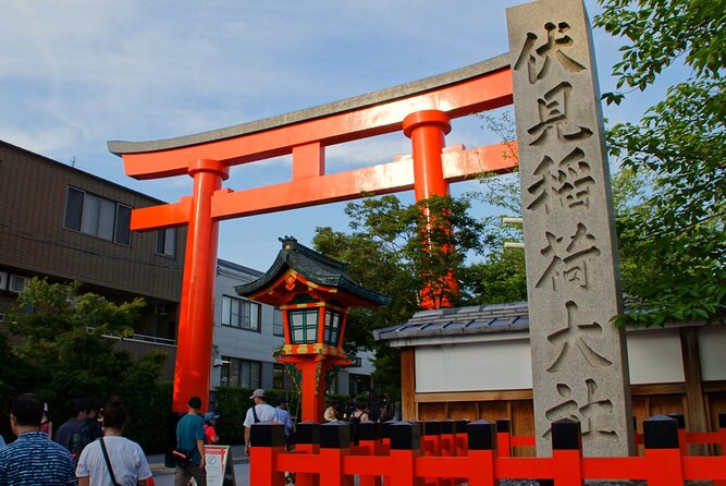 Kyoto: Fushimi Inari Shrine Walking Tour - Walking beneath the orange-red torii gates