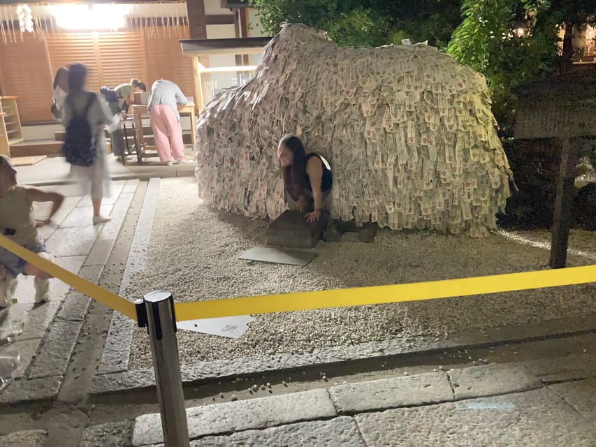 Kyoto: Gion Evening Walk with Hidden Gems, Geisha & Sake - Yasui Kompira-gū and the power stone