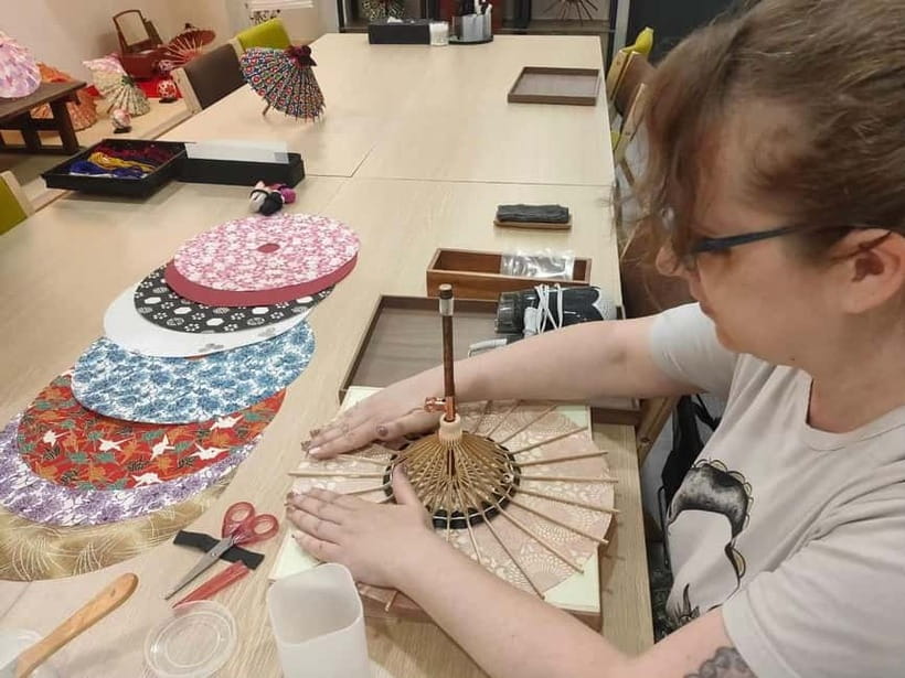 Kyoto: Traditional Mini Umbrella Making Workshop - Choosing a design before the careful work begins