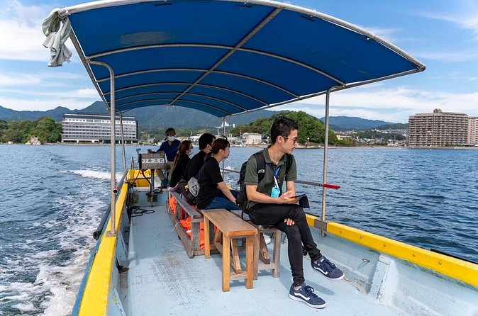 Miyajima Guided Tour and Fresh Oyster Farm Tour - Seeing the Great Torii from the water