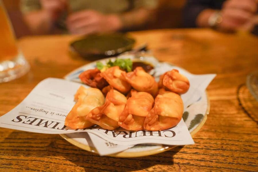 Naha Bar Hopping Tour in Okinawa - Second stop: Naha’s back alleys and the biggest food stop