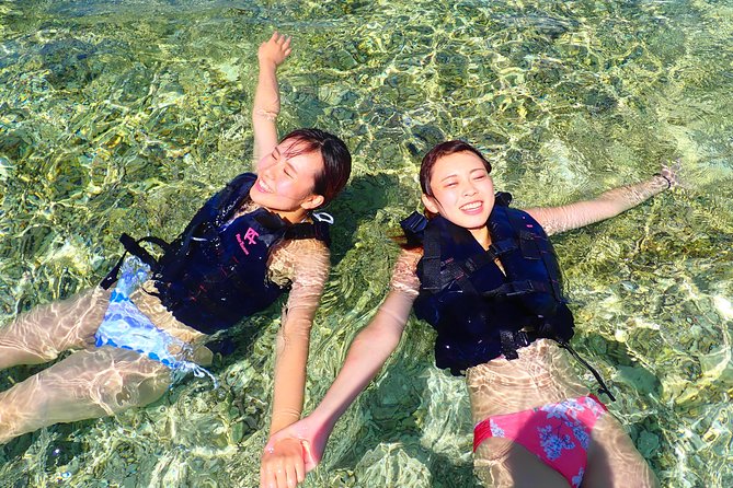 Okinawa Iriomote Snorkeling Tour at Coral Island - What the guides add to the experience