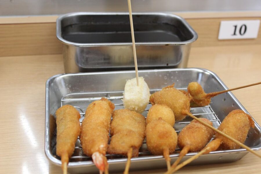 Osaka: Food Tour at Night with Tastings - Stories, bars, and a quieter side of the district