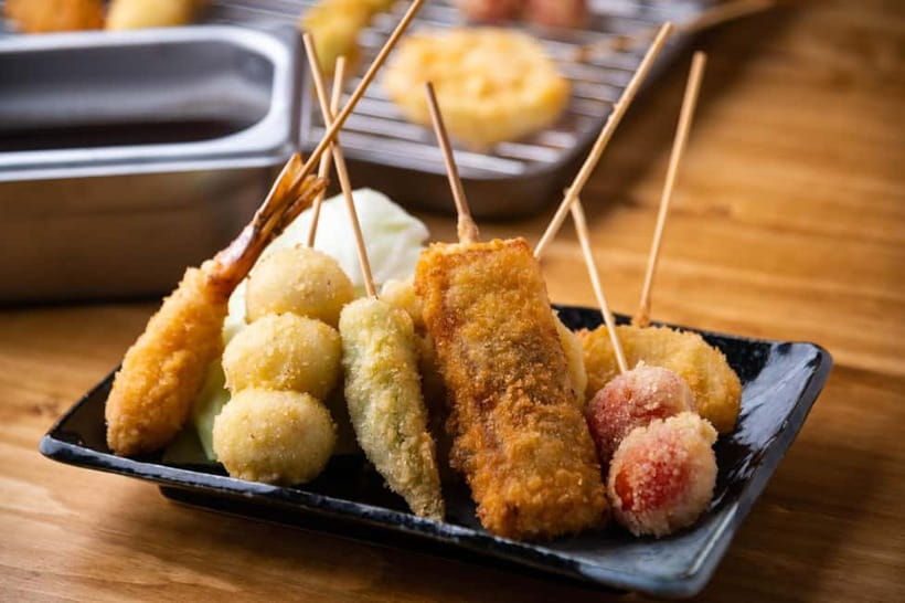 Osaka: Food Tour Kuromon Market & Dotonbori with Guide - The custard tart finish
