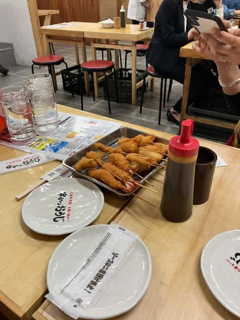 Osaka: Private and Fully Customized Tour with Hotel Meet Up - Kuromon Ichiba Market: a short stop with food potential