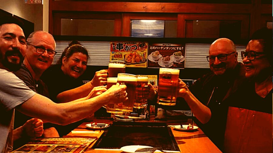 Osaka: Shinsekai Food Tour with 13-15 Dishes at 5 Eateries - The izakaya stop: udon, yakitori, wings, and nagaimo