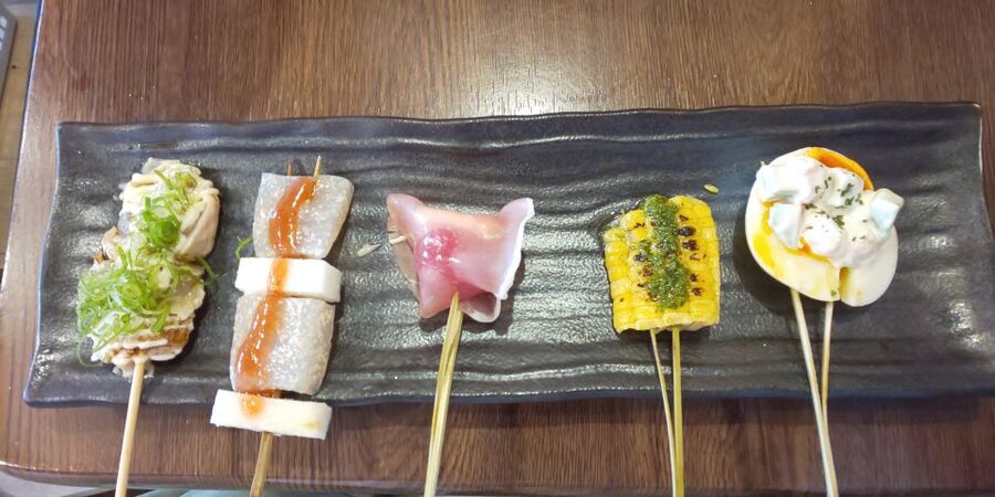 Osaka: Shinsekai Food Tour with 13-15 Dishes at 5 Eateries - The final stop: tonpeiyaki, karaage, edamame, and more