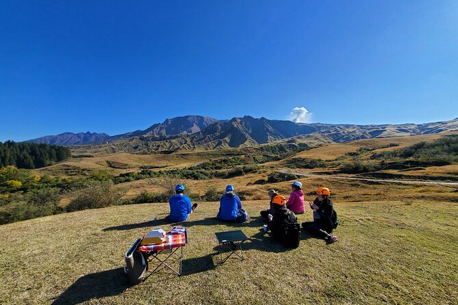 Private E-MTB guided cycling around Mt. Aso volcano & grasslands - Reaching smoking Nakadake Crater