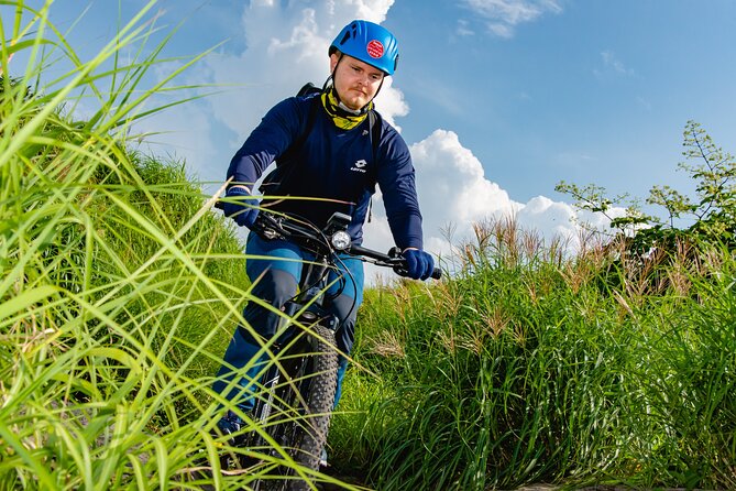 Private E-MTB guided cycling around Mt. Aso volcano & grasslands - Getting ready at Aso Station