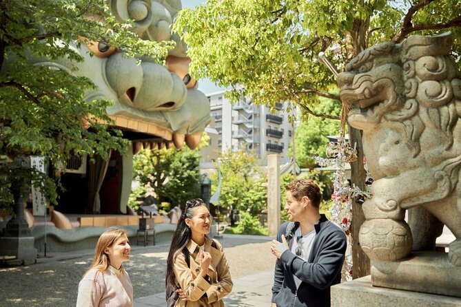 Private Osaka Walking Tour: Highlights & Hidden Gems - Namba begins with lions, lanes, and local flavor