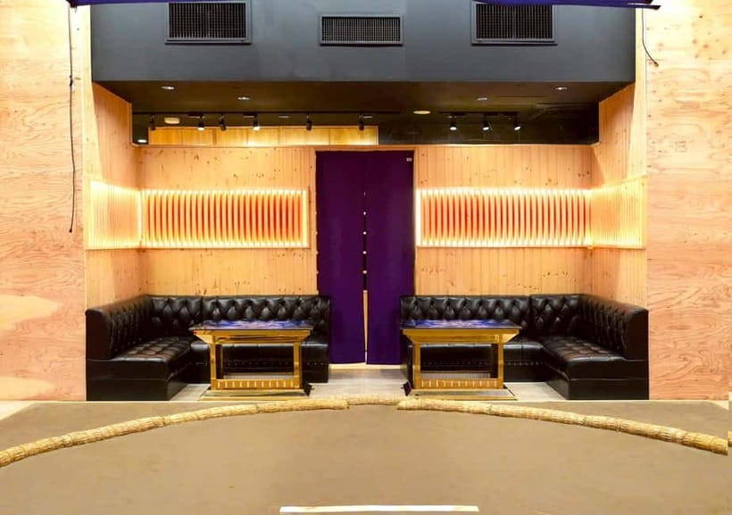 Sapporo: Sumo Show Experience with Japanese food & Photo - The former wrestlers take the dohyo