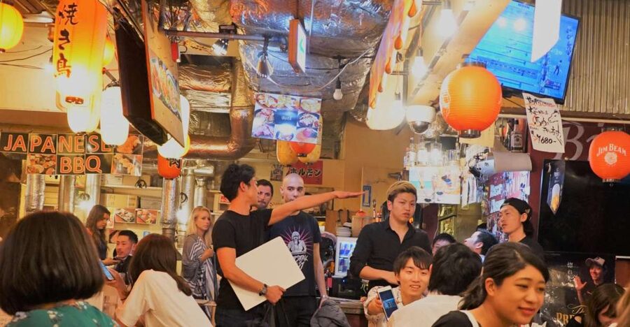 Shibuya Meltdown Night Tour: All-You-Can-Drink Bar Hopping - Starting beneath the Shibuya Tsutaya sign