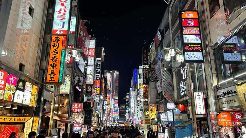 Tokyo: Akihabara, Shibuya, Karaoke & City Lights Night Tour - Walking through Kabukichō in Shinjuku