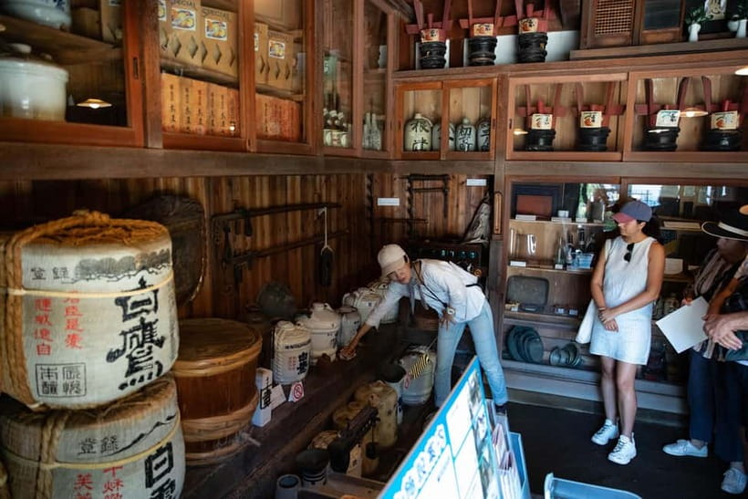 Tokyo: Old Quarter Yanaka Walking Tour - Yanaka Cemetery under the tall trees