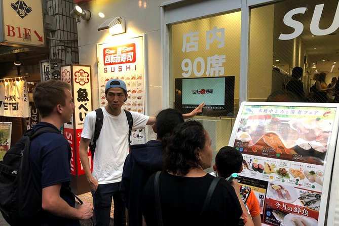 Tokyo: Shibuya Highlights Walking Tour - Crossing Shibuya’s giant pedestrian stage