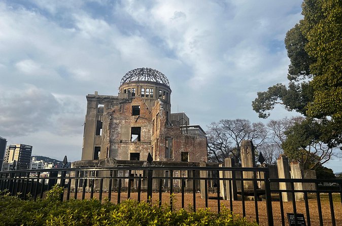 Walking Through History: Hiroshima's Path to Peace - The cenotaph and the line it asks you to remember