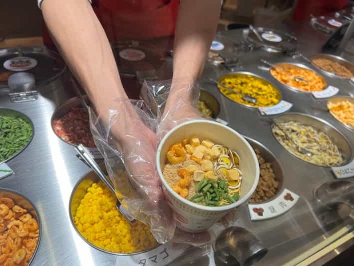 Yokohama: Guided Cup Noodles Museum Tour & Make Your Own Cup - Following the instant ramen production process